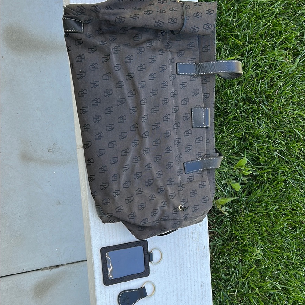 Dooney and Bourke Stylish Black & Brown Tote Bag. Tote bag,key chain, & ID